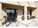 Relaxing patio with seating and dining area, perfect for outdoor enjoyment at 5300 Oakbourne Ave, Davenport, FL 33837