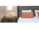 Bedroom with a nightstand and comfortable bedding at 5300 Oakbourne Ave, Davenport, FL 33837