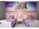 ' bedroom with twin beds and Disney Princess mural at 5300 Oakbourne Ave, Davenport, FL 33837