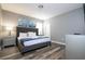 Main bedroom with a king-size bed and nightstands at 5300 Oakbourne Ave, Davenport, FL 33837