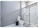 Bathroom with toilet and walk-in shower at 5300 Oakbourne Ave, Davenport, FL 33837