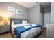 Large bedroom with a king-size bed and ensuite bathroom at 5300 Oakbourne Ave, Davenport, FL 33837