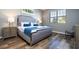 Spacious Primary bedroom with a king-size bed and walk-in closet at 5300 Oakbourne Ave, Davenport, FL 33837