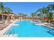 Large community pool with plenty of lounge chairs at 5300 Oakbourne Ave, Davenport, FL 33837
