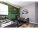 Jurassic World themed bedroom with twin beds and camouflage decor at 5300 Oakbourne Ave, Davenport, FL 33837
