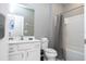 Clean bathroom with white vanity, shower, and toilet at 5300 Oakbourne Ave, Davenport, FL 33837