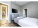 Bedroom with a queen bed and built-in dresser at 5300 Oakbourne Ave, Davenport, FL 33837