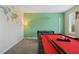 Game room with pool table and foosball at 8834 Cabot Cliffs Dr, Davenport, FL 33896