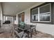 Relaxing covered patio with outdoor furniture, perfect for entertaining at 8834 Cabot Cliffs Dr, Davenport, FL 33896