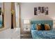Bedroom with a queen bed, dresser and decor at 8834 Cabot Cliffs Dr, Davenport, FL 33896
