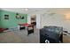 Game room with pool table, foosball, and playful decor at 8834 Cabot Cliffs Dr, Davenport, FL 33896