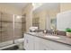 Modern bathroom with double vanity, large shower, and updated fixtures at 8834 Cabot Cliffs Dr, Davenport, FL 33896