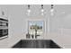 Modern kitchen with stainless steel sink and breakfast bar at 9832 Bucklow Hill Dr, Orlando, FL 32832
