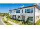 Aerial view of townhouses, showcasing community layout and landscaping at 9832 Bucklow Hill Dr, Orlando, FL 32832