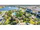 Aerial view of resort-style pool, playground, and lush landscaping at 9832 Bucklow Hill Dr, Orlando, FL 32832