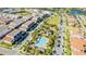 Aerial view of community pool and surrounding townhomes at 9832 Bucklow Hill Dr, Orlando, FL 32832