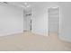 Spacious bedroom with carpeting, walk-in closet, and ensuite bathroom at 9832 Bucklow Hill Dr, Orlando, FL 32832