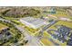 Aerial view of community amenities, including school and parking at 9832 Bucklow Hill Dr, Orlando, FL 32832