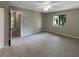 Simple bedroom with carpeted floor and a window at 196 Riverbend Dr # 204, Altamonte Springs, FL 32714