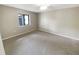 Spacious carpeted bedroom with large window at 196 Riverbend Dr # 204, Altamonte Springs, FL 32714