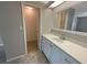 Bathroom with white vanity, and a walk-in closet at 196 Riverbend Dr # 204, Altamonte Springs, FL 32714