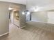Open living area with kitchen, dining and access to balcony at 196 Riverbend Dr # 204, Altamonte Springs, FL 32714