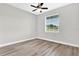 Bright bedroom with ceiling fan and large window at 530 Ellie Ct, Apopka, FL 32703