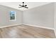 Spacious bedroom with ceiling fan and large window at 530 Ellie Ct, Apopka, FL 32703