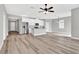 Open concept kitchen with stainless steel appliances and light-colored cabinetry at 530 Ellie Ct, Apopka, FL 32703