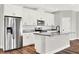 Stainless steel appliances and granite countertops in this kitchen at 524 Ellie Ct, Apopka, FL 32703