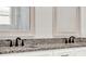 Bathroom features double vanity with granite countertop at 524 Ellie Ct, Apopka, FL 32703