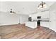 Open kitchen with island, stainless steel appliances, and granite countertops at 524 Ellie Ct, Apopka, FL 32703