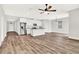 Open floor plan showcasing kitchen and living areas at 524 Ellie Ct, Apopka, FL 32703