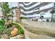 Building lobby with a water feature, plants, and seating area at 2545 S Atlantic Ave # 2107-2108, Daytona Beach Shores, FL 32118