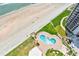 Relaxing oceanfront pool with plenty of lounge chairs for sunbathing at 2545 S Atlantic Ave # 2107-2108, Daytona Beach Shores, FL 32118