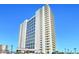 A tall white building with many windows and balconies at 2545 S Atlantic Ave # 2107-2108, Daytona Beach Shores, FL 32118
