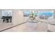 Elegant condo lobby with piano, seating area, and ocean views at 2545 S Atlantic Ave # 2107-2108, Daytona Beach Shores, FL 32118