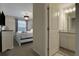 Bedroom with king bed and en-suite bathroom at 4270 Lana Ave, Davenport, FL 33897
