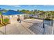 Beach volleyball court with adjacent restroom and pool views at 4270 Lana Ave, Davenport, FL 33897