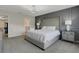 Elegant main bedroom with a large bed and gray walls at 4270 Lana Ave, Davenport, FL 33897