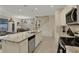 Modern kitchen with stainless steel appliances and granite countertops at 4270 Lana Ave, Davenport, FL 33897