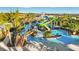 Relaxing lazy river with wooden bridge and waterslides at 4270 Lana Ave, Davenport, FL 33897