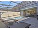 Private screened pool with lounge chairs for ultimate relaxation at 4270 Lana Ave, Davenport, FL 33897
