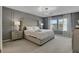 Main bedroom with a large bed, gray walls, and window view at 4270 Lana Ave, Davenport, FL 33897