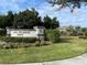 Lake Preserve Park entrance with landscaping and playground in background at 14154 Dove Hollow Dr, Orlando, FL 32824