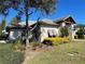 House exterior showcasing stone accents and landscaping at 14154 Dove Hollow Dr, Orlando, FL 32824