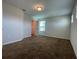 Well-lit bedroom with ample space and a roomy closet at 14154 Dove Hollow Dr, Orlando, FL 32824