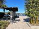 Relaxing poolside lounge area with lake views at 14154 Dove Hollow Dr, Orlando, FL 32824