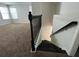 Upstairs loft area with staircase and view of the living area at 14154 Dove Hollow Dr, Orlando, FL 32824