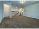 Loft with carpet, walk-in closet, and railing at 14154 Dove Hollow Dr, Orlando, FL 32824